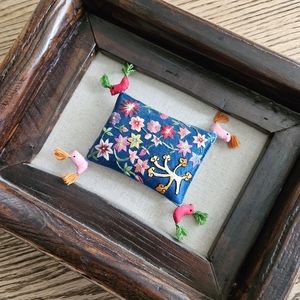 Unusual Framed Art Piece....miniature embroidered pillow on linen
